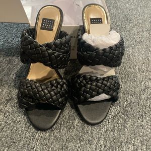 Brand new dress shoe never worn. They are a slide 2 inch heel.